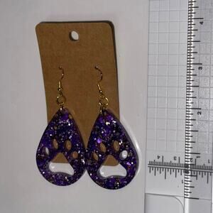 Handmade epoxy resin dangle paw print earrings - purple and gold glitter